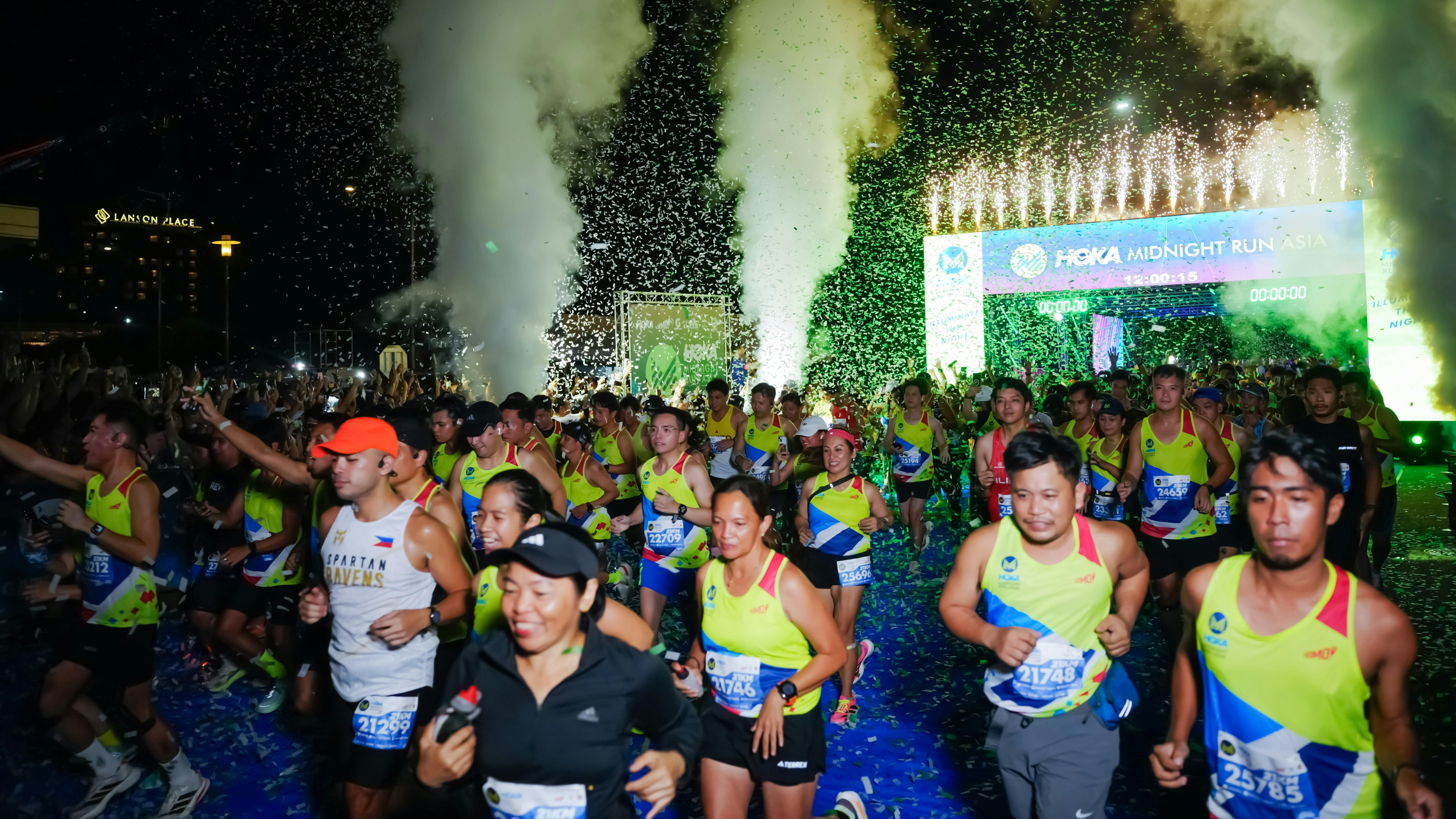 Around 18,000 join Midnight Run Manila as Lee, Camacho shine in 21K neon-lit race